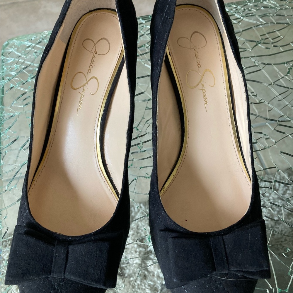 Jessica Simpson Black ultra suede quilted wedge heels with a bow on top. Sz.9